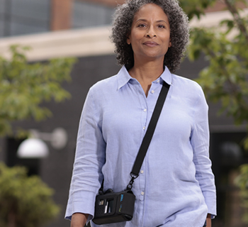 Woman walking outside wearing LifeVest